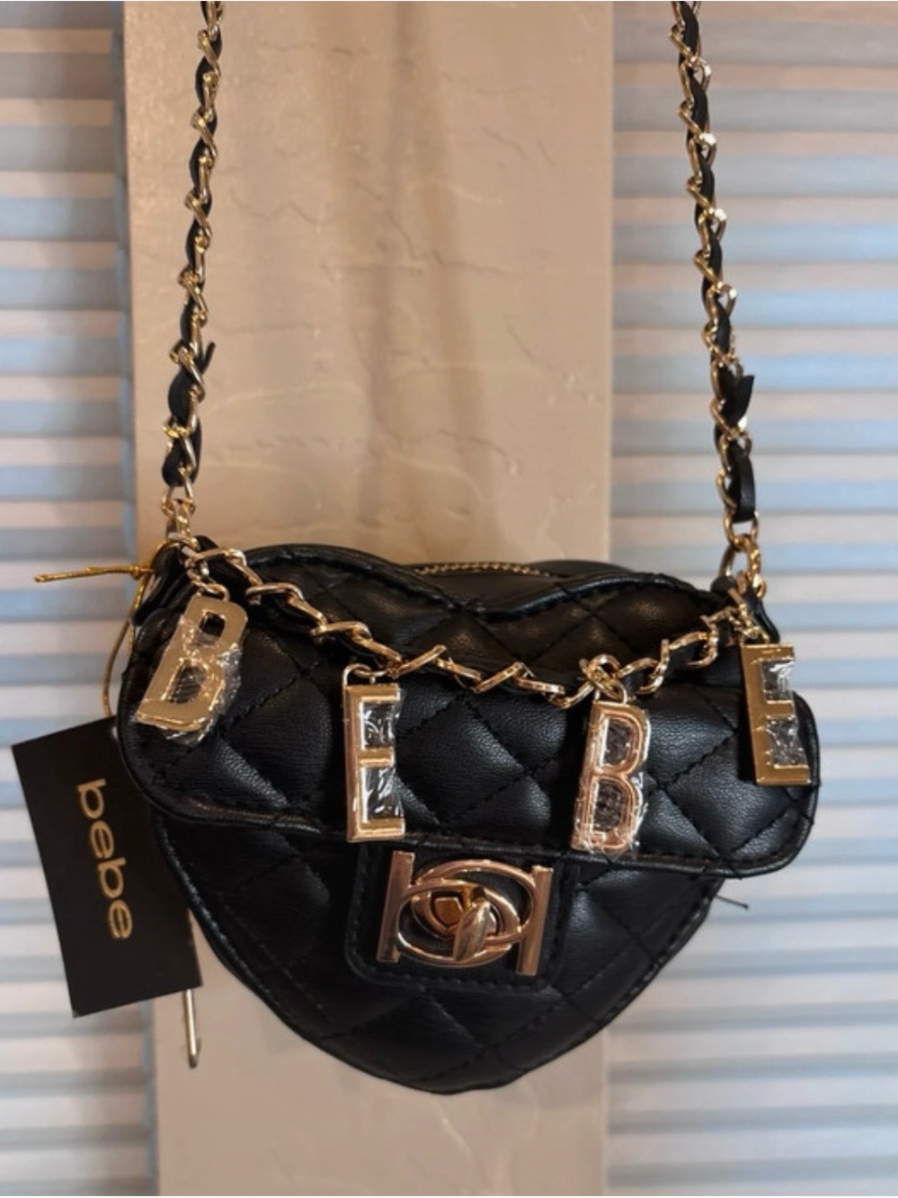 bebe Black Quilted Heart Mini Crossbody with Gold Accents